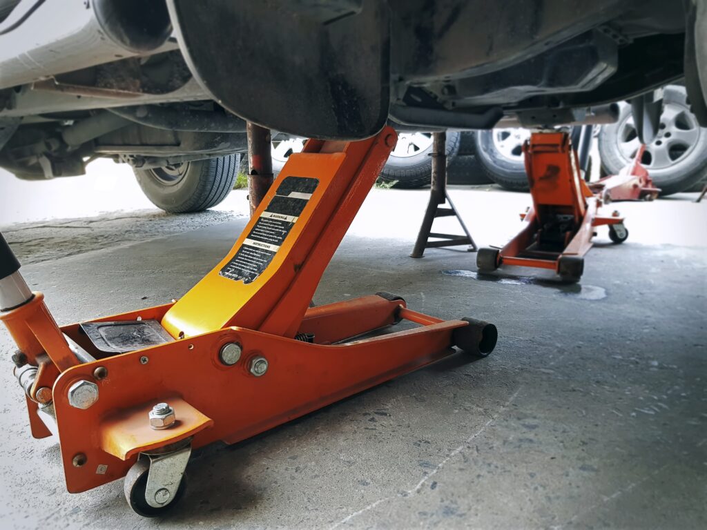 orange hydraulic jacks for car repair service 2024 05 31 00 43 41 utc scaled